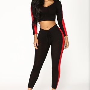 Black and red track suit